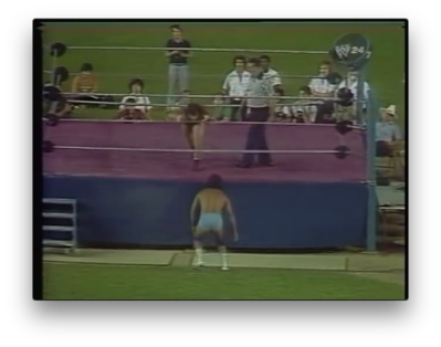 Tatsumi Fujinami dives onto Chavo Guererro at WWF Showdown at Shea 1980